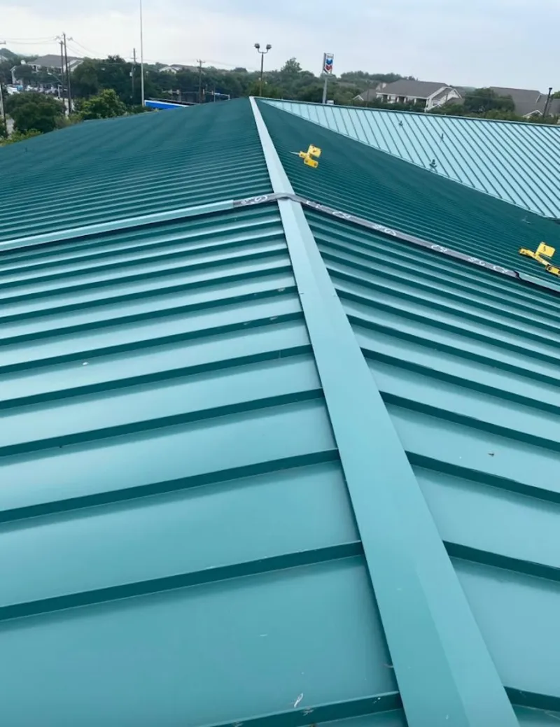 Green commercial metal roof ridge and valley for Metal Roof Repair in Laramie